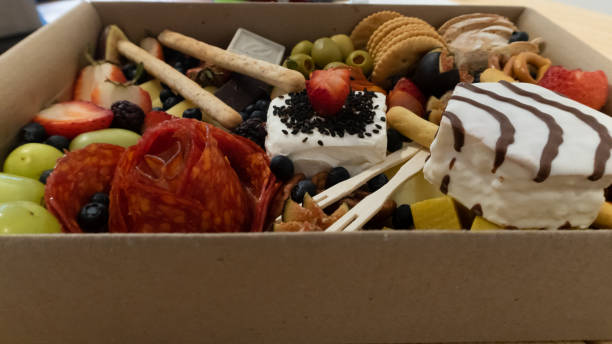 istock cold meat tray with grapes, figs, cheese, strawberries and bread 1316493748