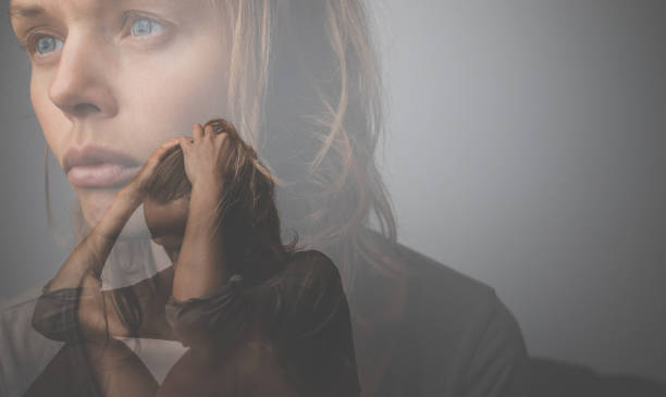 depressed, anxious young woman suffering from mental disorders, illness - depression imagens e fotografias de stock