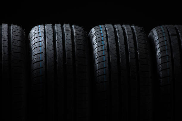 istock Stack of brand new high performance car tires 1316496304