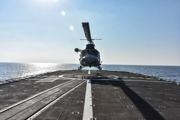 istock a helicopter landed on a frigate 1316496404