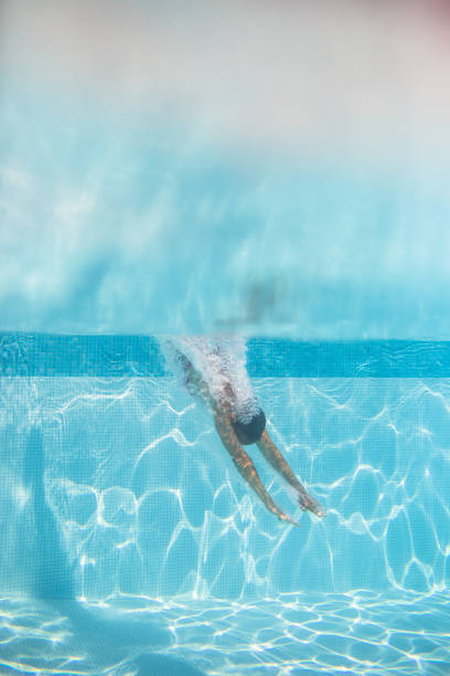 istock Young woman in a swimming pool 1316496524