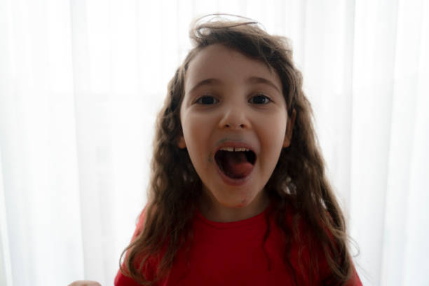 Little girl with candy close up