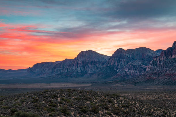 istock Sunset Upon Desert Valley Floor before the Spring Mountain Range Red Rock Canyon 1316497719
