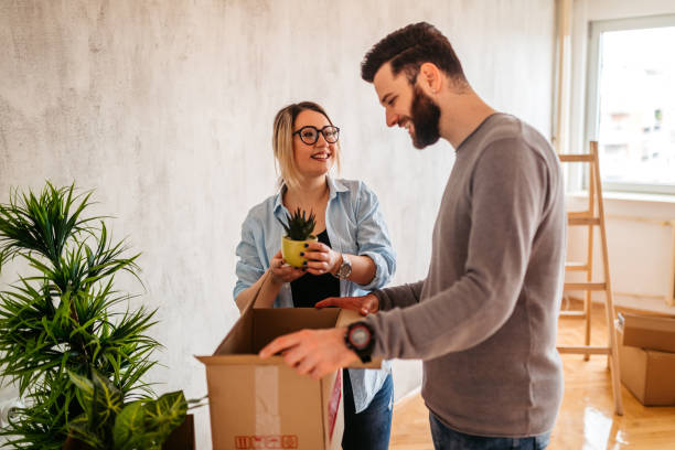istock Young couple unpacking in their new apartment 1316500068
