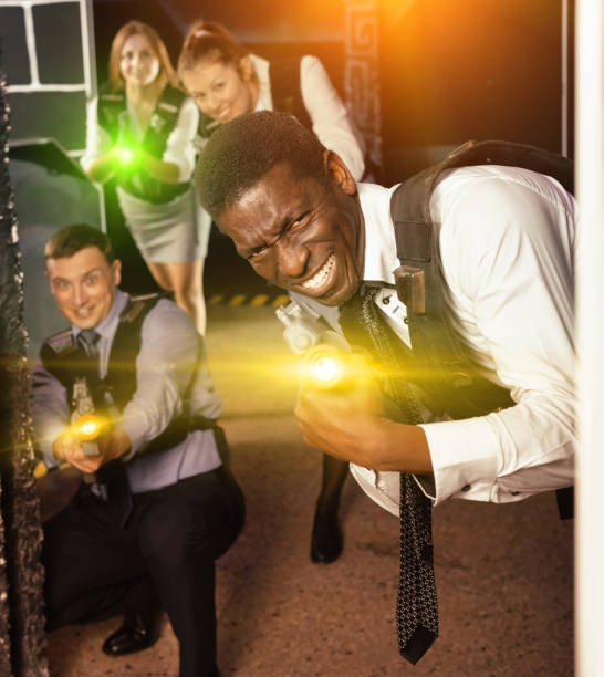 istock African American with laser gun playing laser tag 1316505583