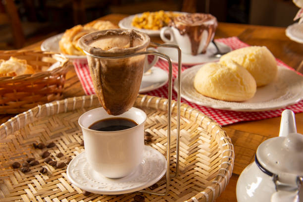 istock coffee strained straight into the cup on a table with cheese bread 1316505918