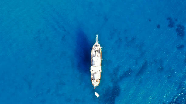 istock sailboat in blue sea 1316507558