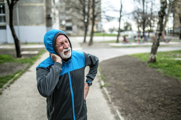 istock Sporty senior man having a strong neckache. 1316511087