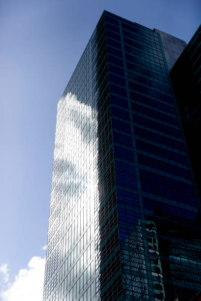 istock Low angle view of modern office building, skyscrapers, sky background with copy space 1316511783