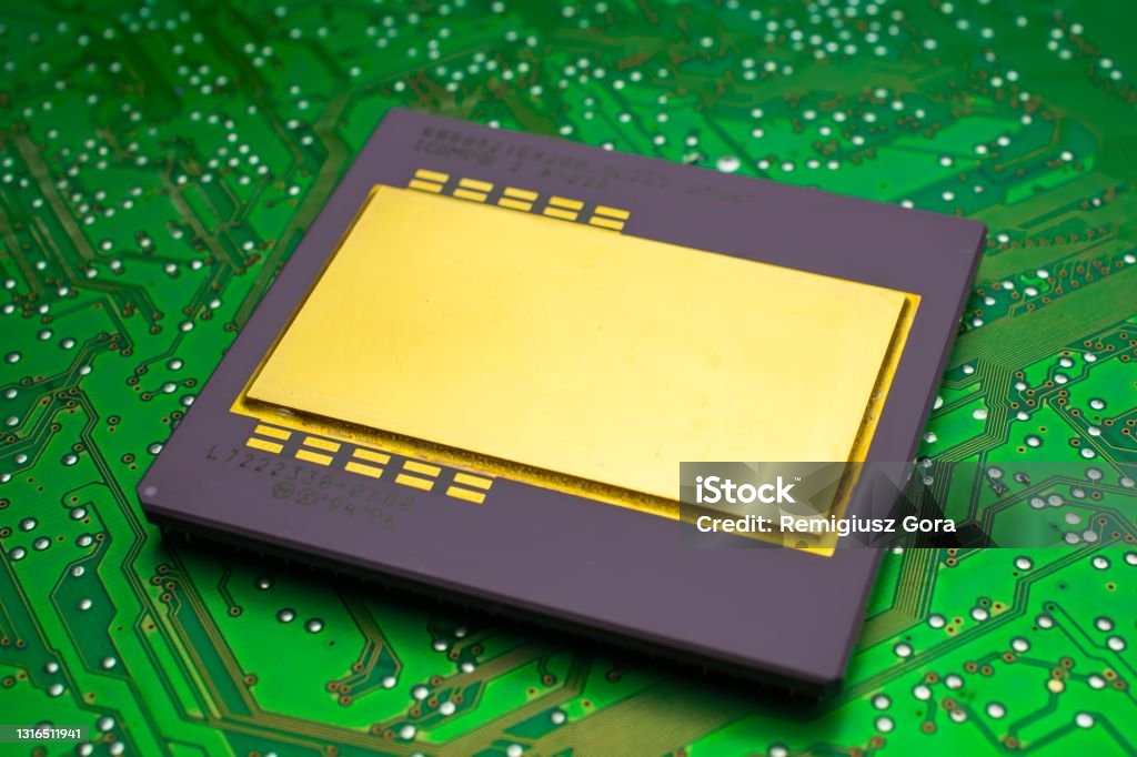 large, gold-plated ceramic processor. intel pentium pro on green PCB. gold recovery and recycling Business Stock Photo
