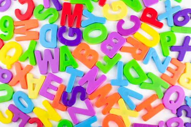 istock colorful letters are randomly scattered on a white background 1316515292