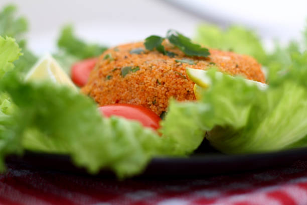 istock Traditional Turkish bulgur salad Kisir close-up on a plate on the table. Horizontal view from above 1316516620