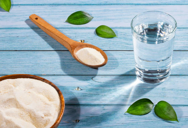 istock Powdered collagen protein - Glass of water 1316519409