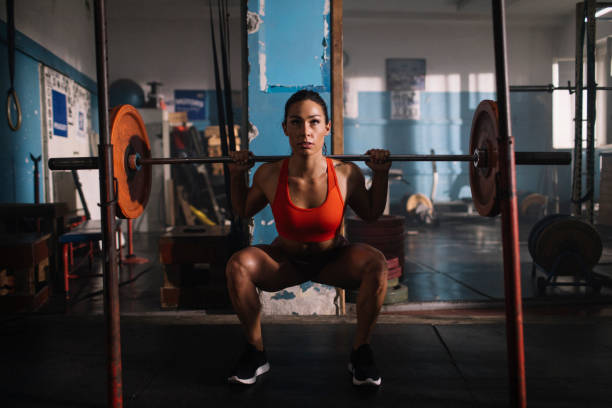 istock Squatting her way to success 1316522081