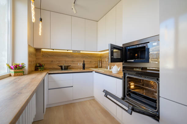 istock Modern white and beige wooden kitchen interior with oven opened 1316524555