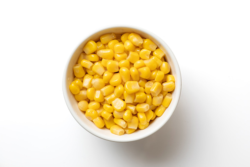 sweet corn in the white bowl