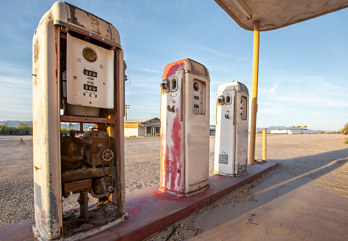 An abandoned and run down cafe/gas station in the California desert.