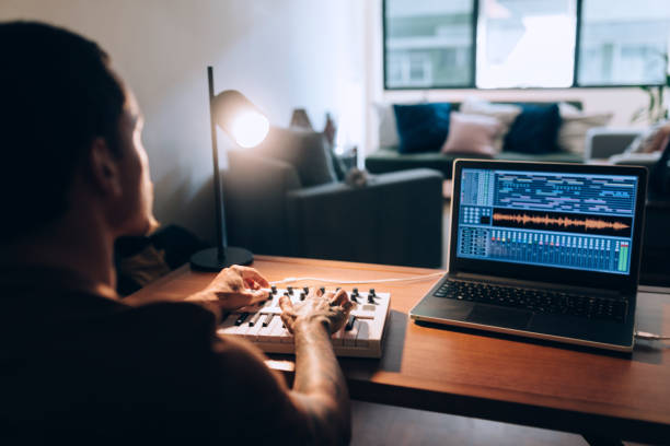 istock Musician recording at home 1316532961