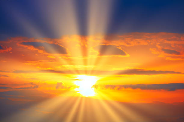 istock Spectacular orange sky with sun rays in the evening 1316539265