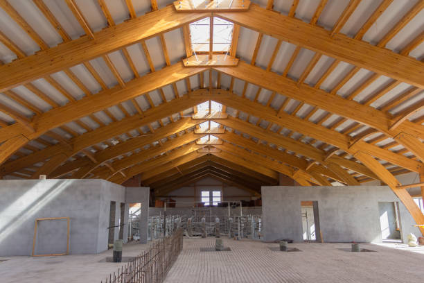 istock Large hangar. Glued laminated timber construction. Roof construction of laminated veneer lumber. Building. Glued laminated timber. Building. Construction site 1316541308