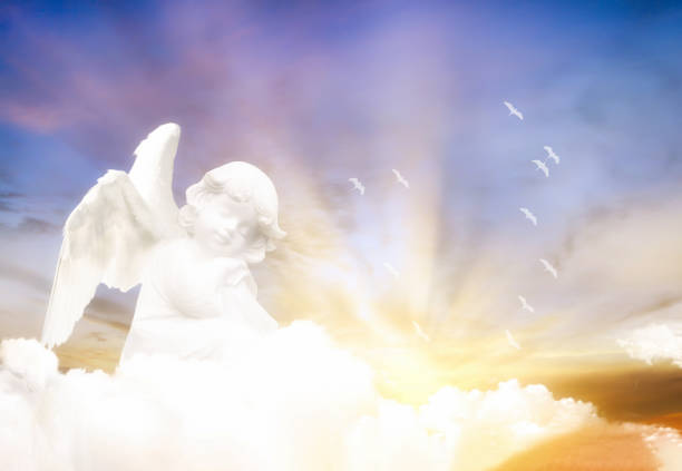 istock Angels in the clouds. Cloud background with bright colors and sun rays. 1316541607