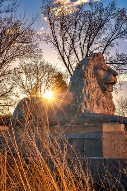istock Sun Beam Shining Over A Park Statue 1316545279