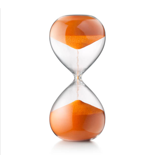 Running through time. Impossible hourglass. Hourglass isolated on white background. half past stock pictures, royalty-free photos & images