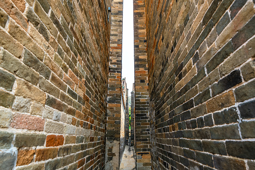 Narrow between the houses in Ping Shan Heritage Trail historical street, Hong Kong