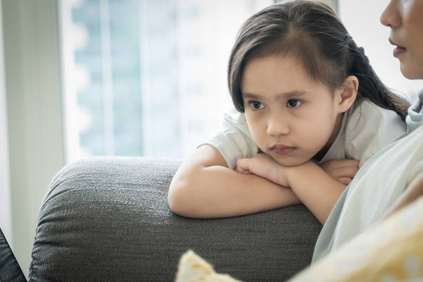 istock Child showing tantrum or meltdown behavior at the sofa 1316559204