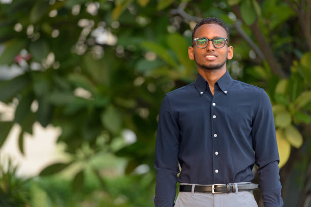 istock Handsome African businessman outdoors at rooftop garden 1316562811