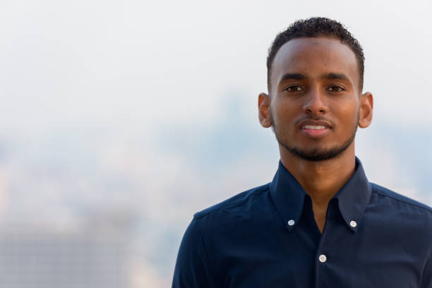 istock Confident African businessman outdoors at rooftop looking at camera 1316562813