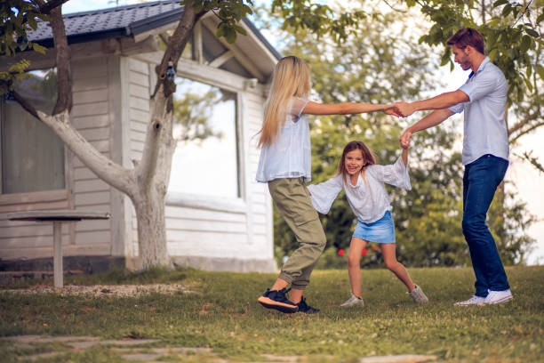 istock Happy family in backyard. 1316566051