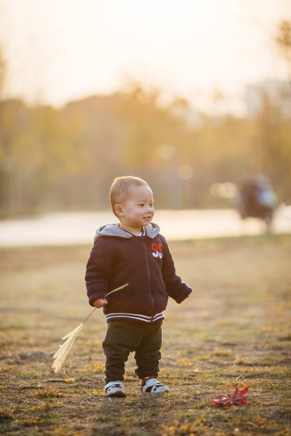 istock Cute small child playing in the park 1316567896