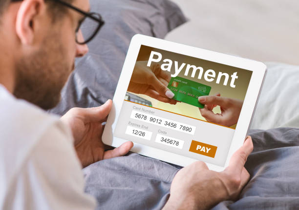 istock Young man shopping online from home, using digital tablet 1316568829