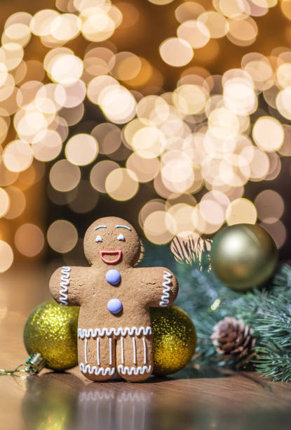 istock Gingerbread man on a Christmas background. Background with cookie and New Year decorations. 1316571542