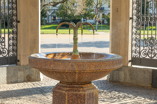 famous Kochbrunnen (cooking well) in Wiesbaden with healthy hot spring and historic fountain