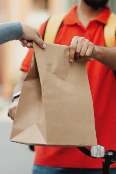 istock Food delivery from restaurant during covid-19 lockdown and fast service 1316572444