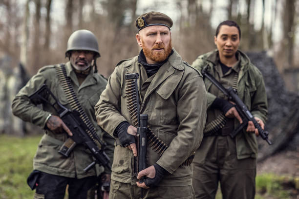 istock Three soldiers during a military outdoor operation 1316573493