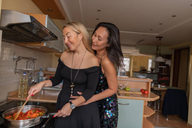 istock A Lesbian Couple is Preparing and Making Delicious Dinner Together. 1316574796
