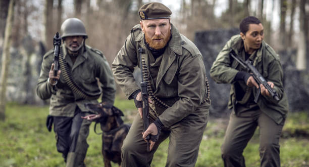 istock Three soldiers during a military outdoor operation 1316575078