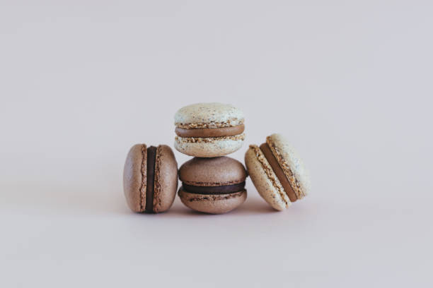 istock Tasty French macarons  on a pastel background. 1316575180