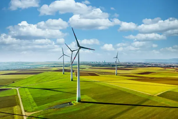 Aerial drone view of wind turbines.