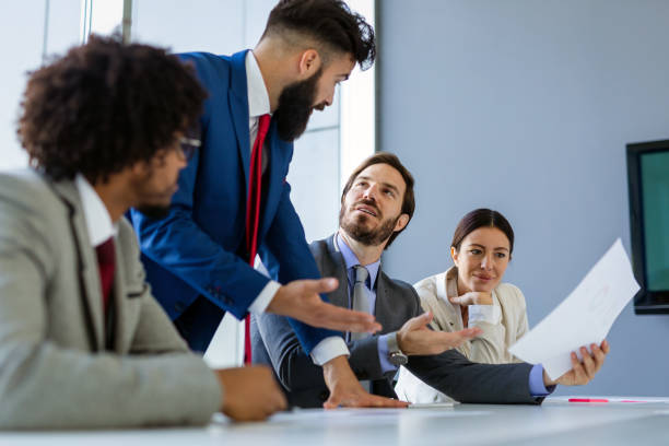 istock Business team working together on meeting, analyzing financial documents in office 1316580604