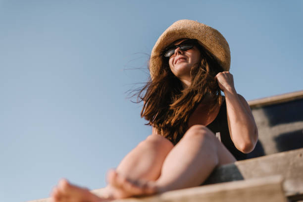 istock Woman enjoying sunshine 1316581405