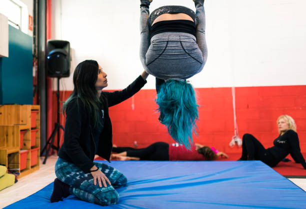 istock The circus school teacher shows the student an exercise technique 1316582839