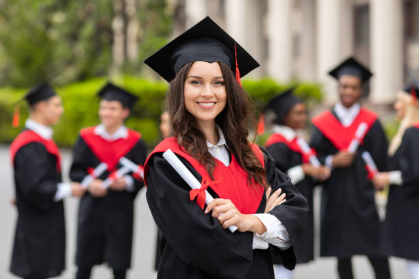 istock Positive pretty lady student having graduation party 1316584845