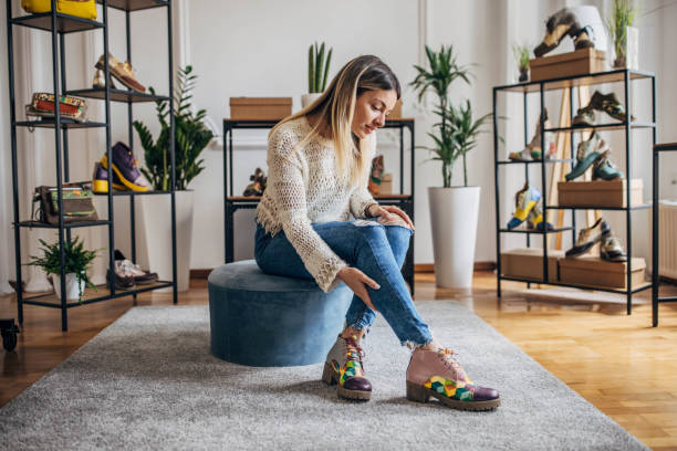 istock Woman trying on shoes 1316585442