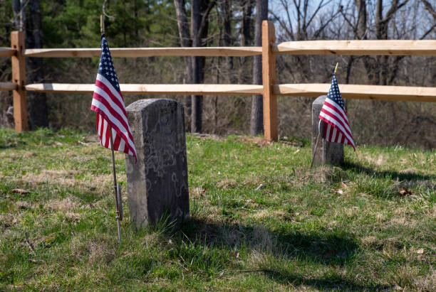 istock Revolutionary War gravestones with American flags 1316585572