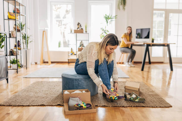 istock Woman trying on new shoes 1316585932