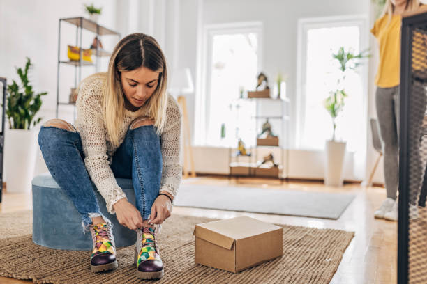 istock Woman trying on new shoes 1316585954